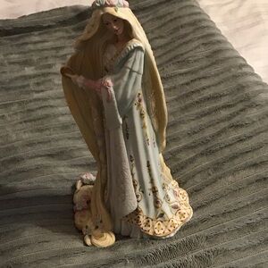 Elegant Figurine with Floral Details